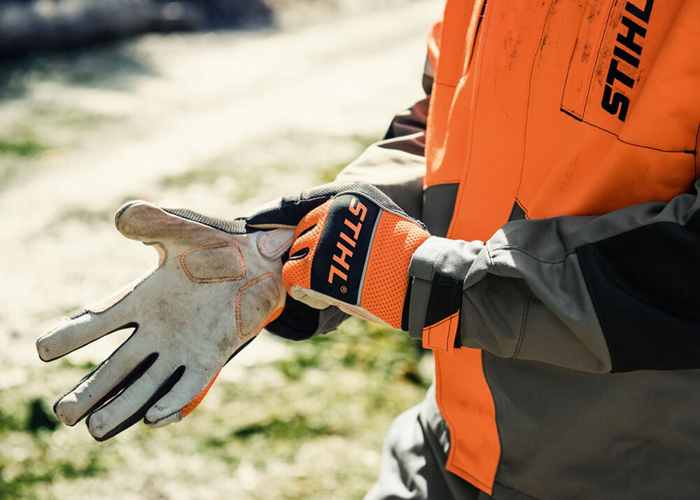 What safety gear do I need for using a chainsaw